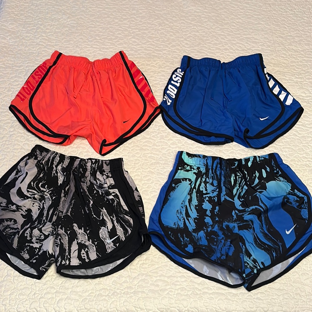 Women’s Nike running shorts: 4 pairs, all XS
